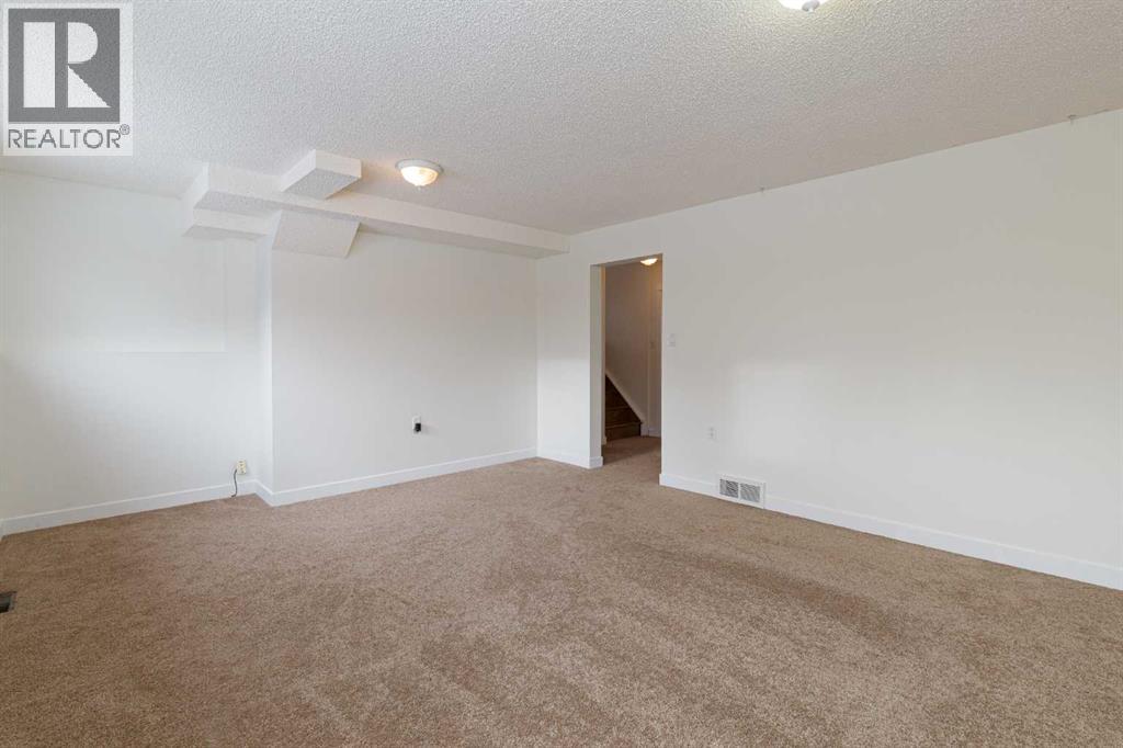 256 Queen Tamara Way Se, Calgary, Alberta  T2J 4E7 - Photo 31 - A2278377