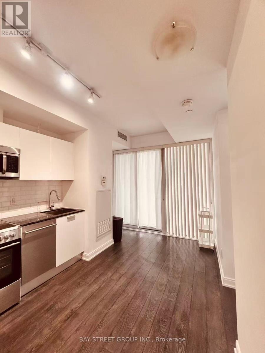 <div class="slider-price">$2,050 Monthly</div><p>2103 - 42 Charles Street E, Toronto, Ontario</p>