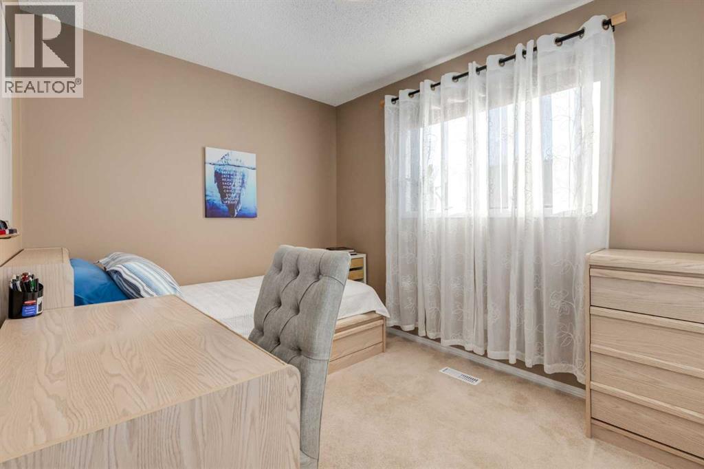 35 Woodstock Road Sw, Calgary, Alberta  T2W 5V8 - Photo 19 - A2280324