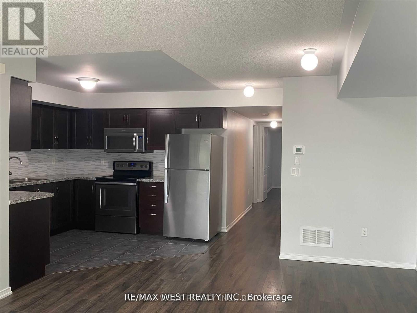 421 - 130 Widdicombe Hill Boulevard, Toronto, Ontario  M9R 4A6 - Photo 7 - W12716840