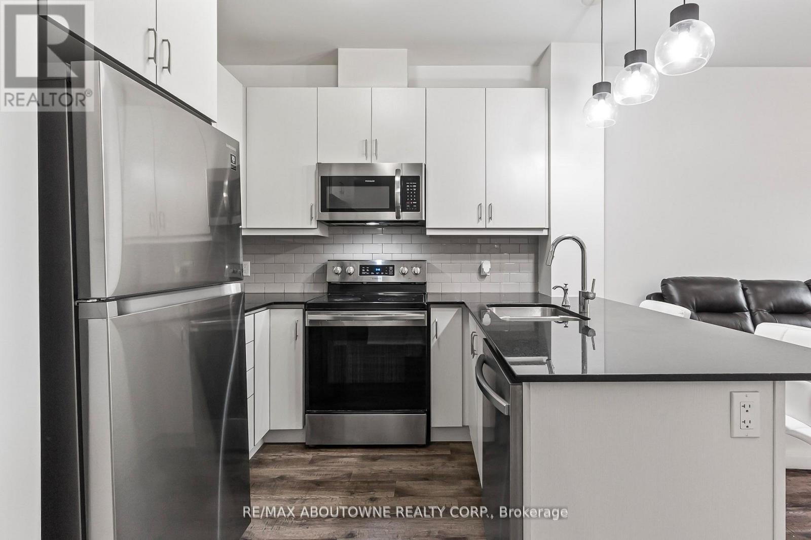 121 - 102 Grovewood Common, Oakville, Ontario  L6H 0X2 - Photo 4 - W12716956