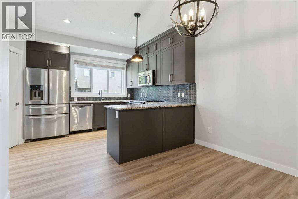 1, 4513 Bowness Road Nw, Calgary, Alberta  T3B 0A9 - Photo 2 - A2260033