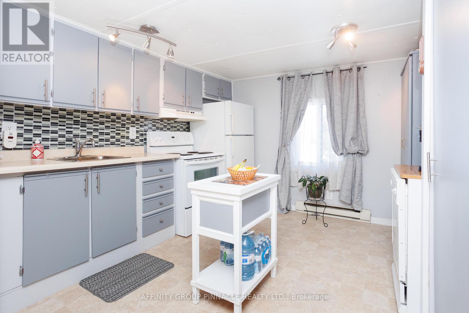 39 Ash Loop Street, Kawartha Lakes, Ontario  K9V 0K1 - Photo 11 - X12717424