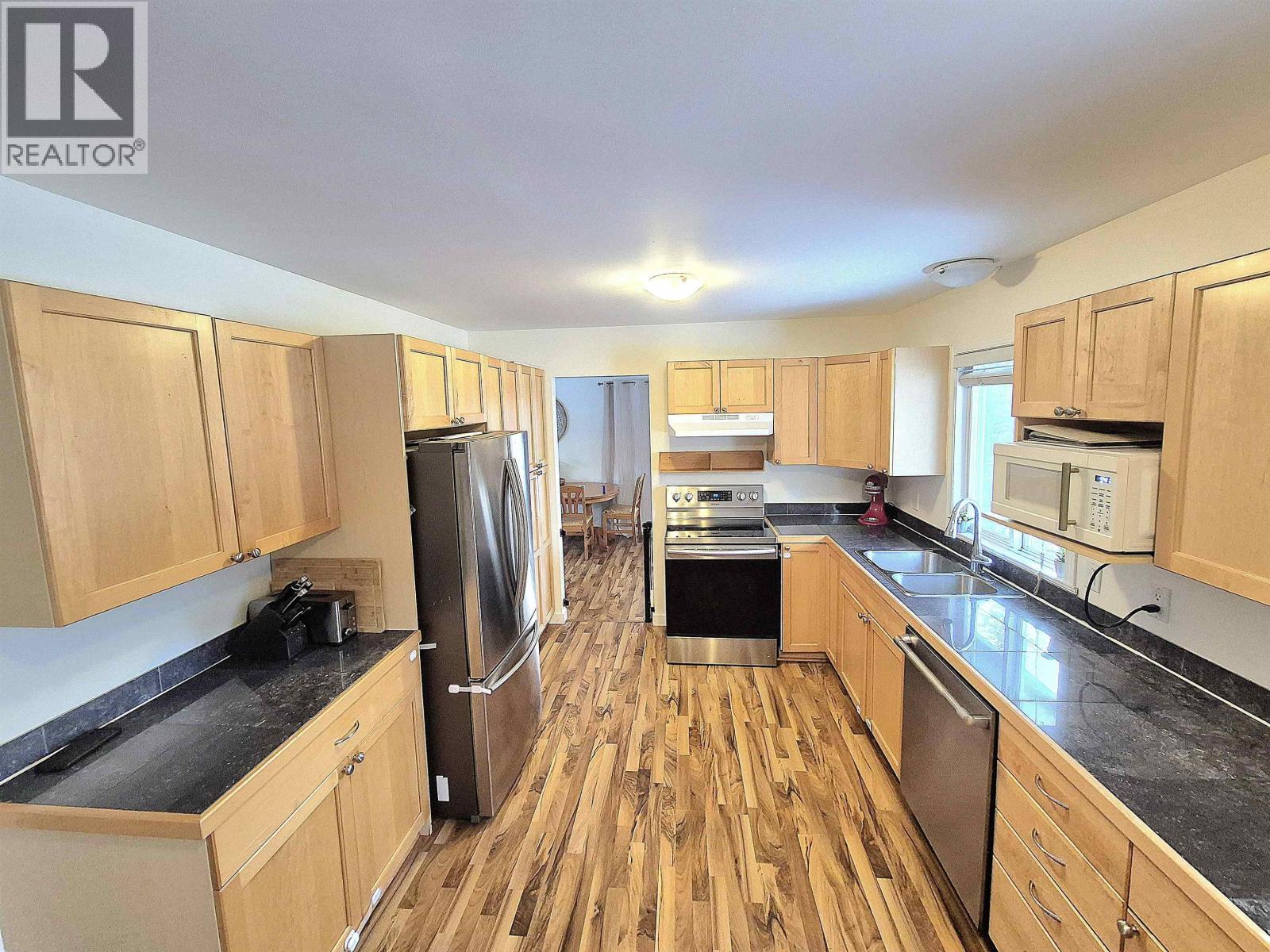 4765 Chilcotin Crescent, 108 Mile Ranch, British Columbia  V0K 2Z0 - Photo 2 - R3081823