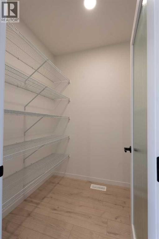 143 Wolf Hollow Rise Se, Calgary, Alberta  T2X 4M8 - Photo 10 - A2269119