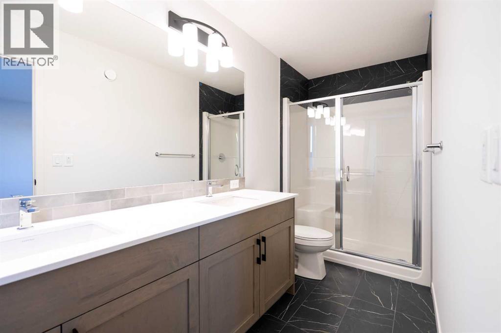 143 Wolf Hollow Rise Se, Calgary, Alberta  T2X 4M8 - Photo 27 - A2269119