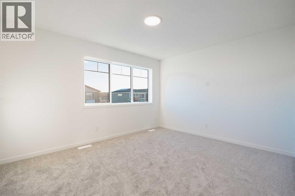 143 Wolf Hollow Rise Se, Calgary, Alberta  T2X 4M8 - Photo 19 - A2269119