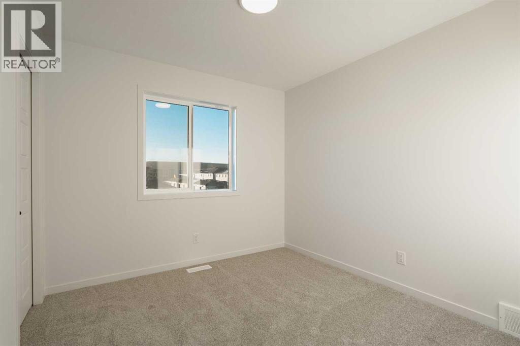 143 Wolf Hollow Rise Se, Calgary, Alberta  T2X 4M8 - Photo 23 - A2269119