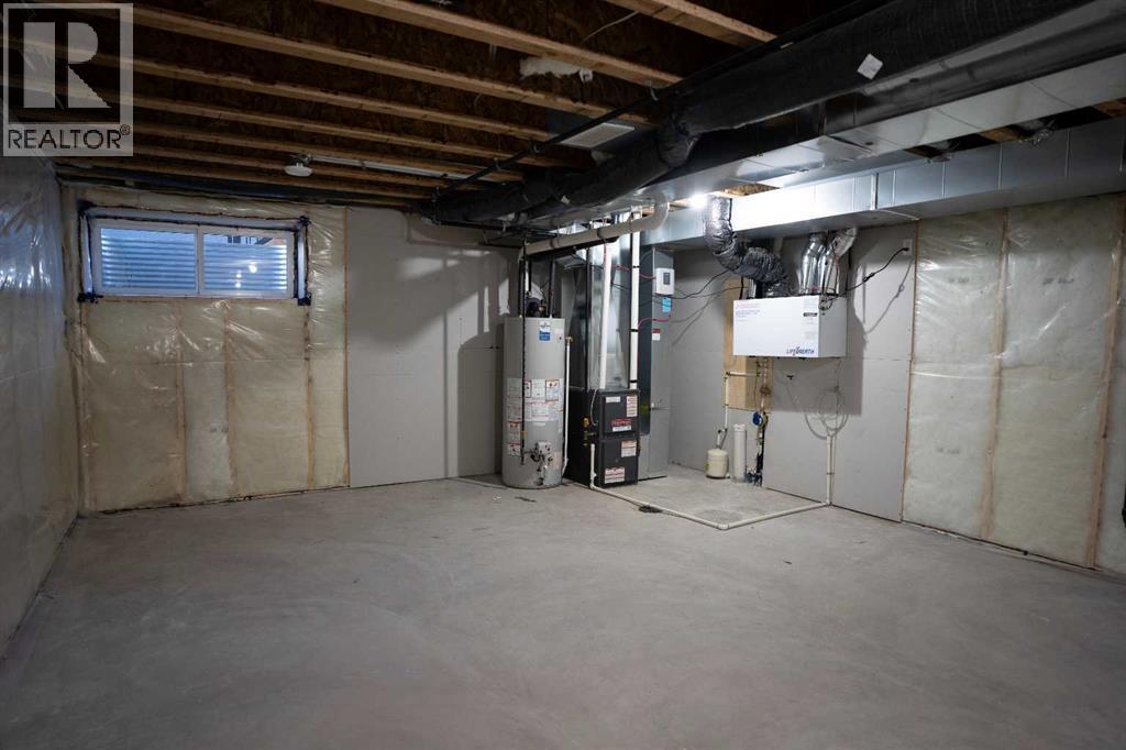 143 Wolf Hollow Rise Se, Calgary, Alberta  T2X 4M8 - Photo 30 - A2269119