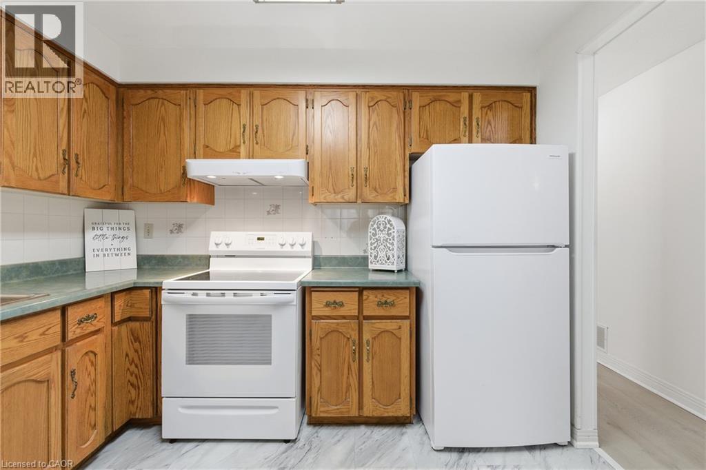 8 Village Green Boulevard Unit# 208, Stoney Creek, Ontario  L8G 5B8 - Photo 10 - 40797717