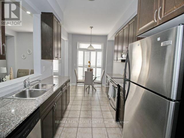 38 Whitmer Street, Milton (Sc Scott), Ontario  L9T 0R5 - Photo 10 - W12717938