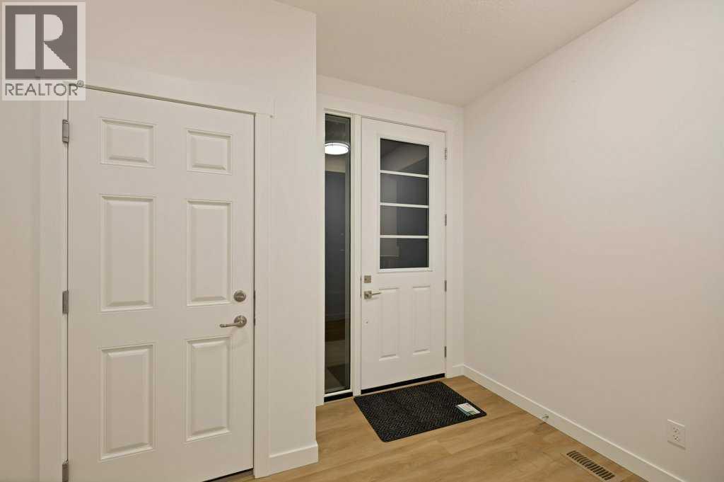 19 Chelsea Port Link, Chestermere, Alberta  T1X 3H4 - Photo 6 - A2280531