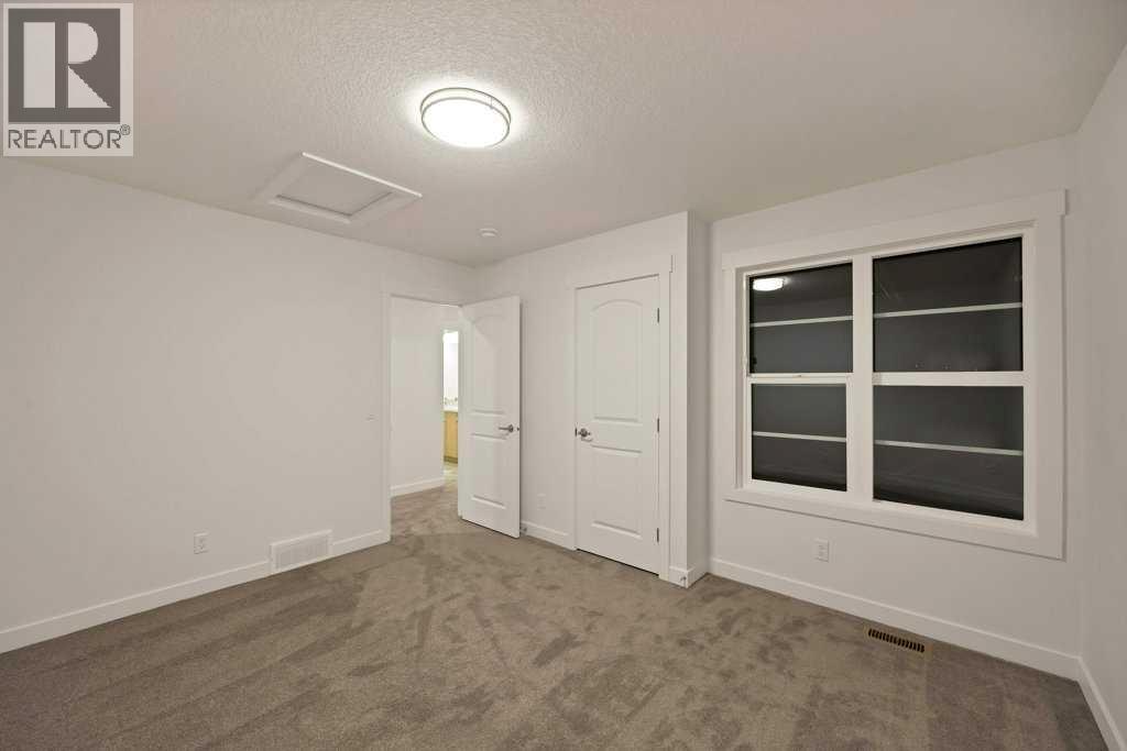 19 Chelsea Port Link, Chestermere, Alberta  T1X 3H4 - Photo 31 - A2280531