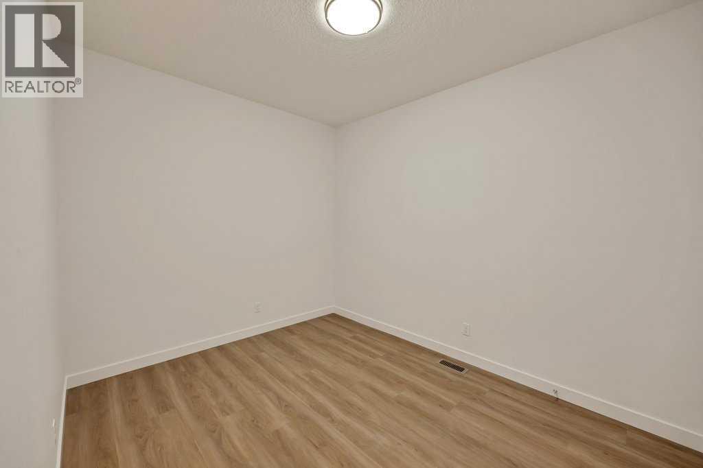 19 Chelsea Port Link, Chestermere, Alberta  T1X 3H4 - Photo 9 - A2280531