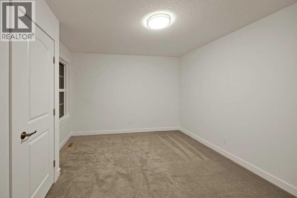 19 Chelsea Port Link, Chestermere, Alberta  T1X 3H4 - Photo 32 - A2280531