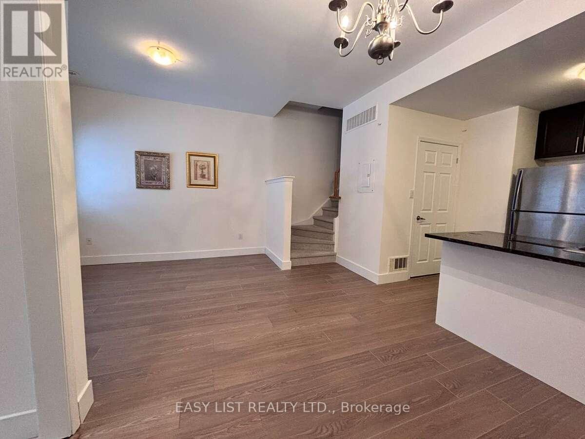 12 - 25 Coneflower Crescent, Toronto, Ontario  M2R 0A5 - Photo 3 - C12718370