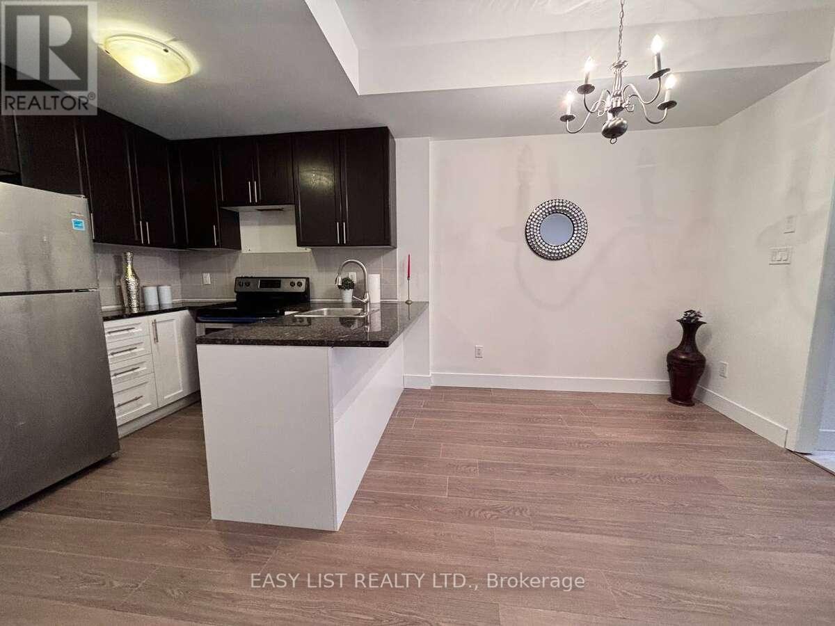 12 - 25 Coneflower Crescent, Toronto, Ontario  M2R 0A5 - Photo 4 - C12718370