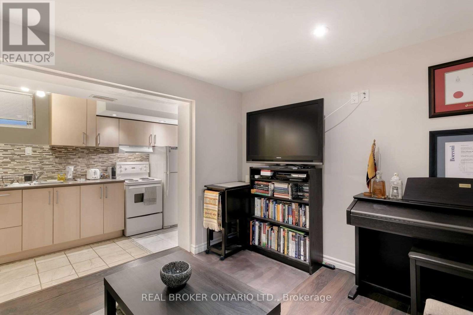 L-Front - 57 Lanark Avenue, Toronto, Ontario  M6C 2B5 - Photo 3 - C12718416