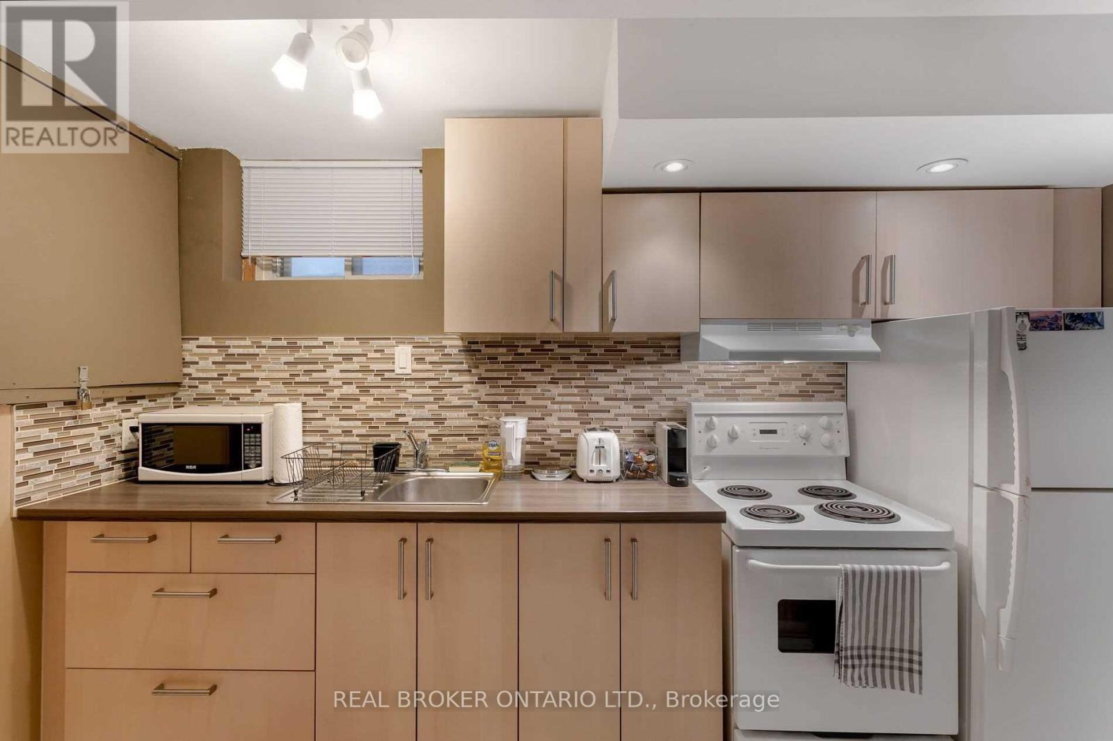 L-Front - 57 Lanark Avenue, Toronto, Ontario  M6C 2B5 - Photo 5 - C12718416