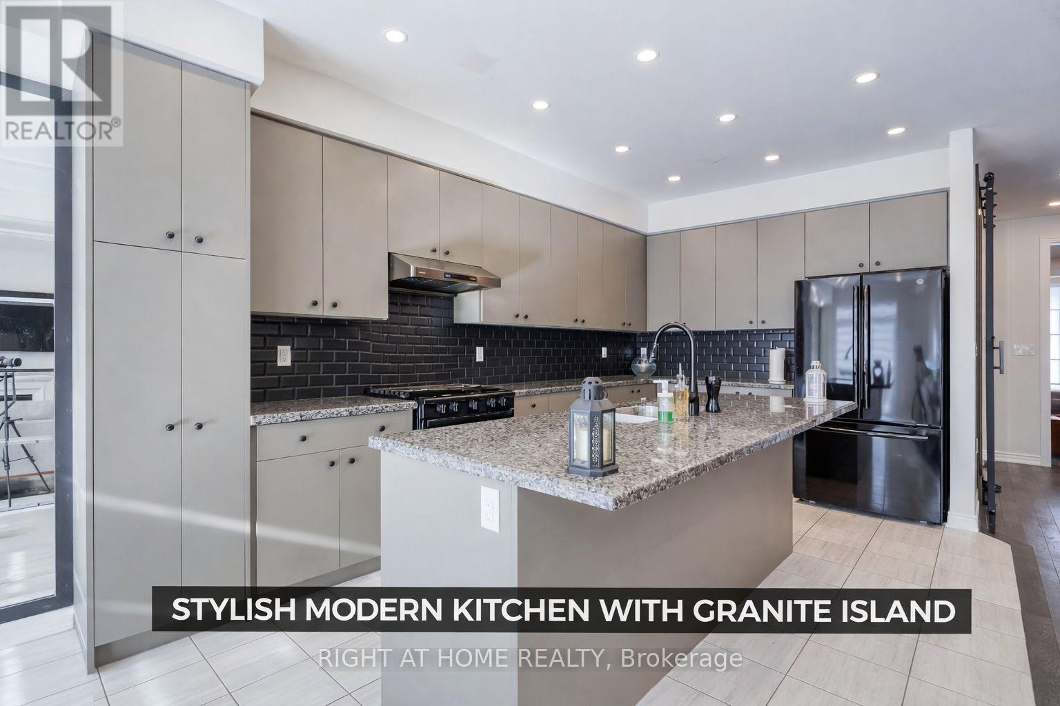 33 Auckland Drive, Whitby, Ontario  L1P 0H4 - Photo 9 - E12718580