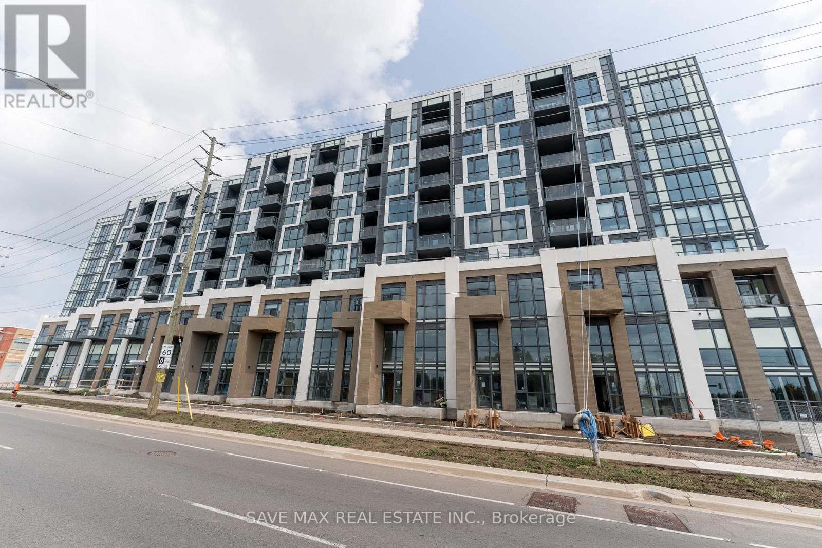 205 - 509 Dundas Street W, Oakville, Ontario  L6M 4M2 - Photo 2 - W12718530