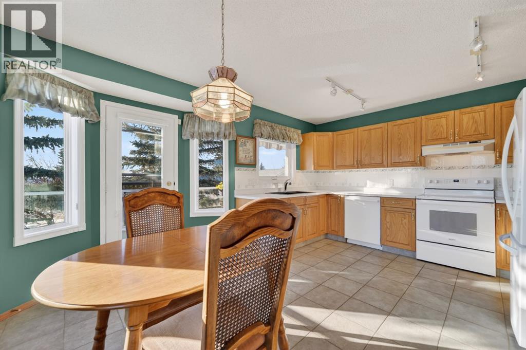 206 Arbour Cliff Close Nw, Calgary, Alberta  T3G 3W7 - Photo 8 - A2278123