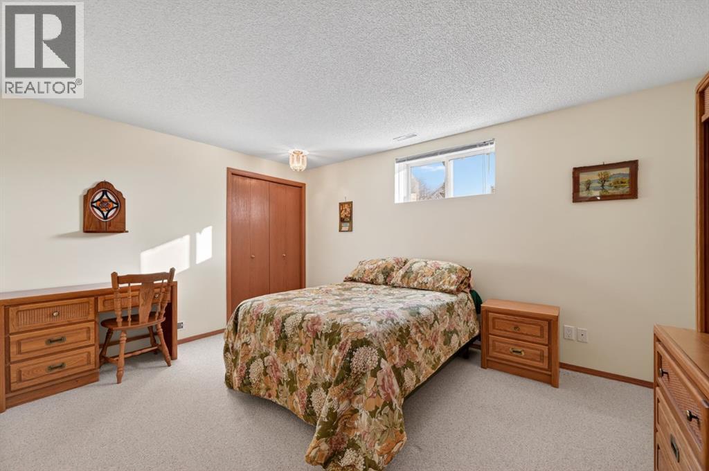 206 Arbour Cliff Close Nw, Calgary, Alberta  T3G 3W7 - Photo 24 - A2278123