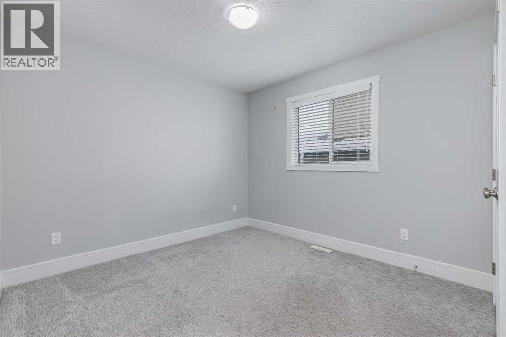 27 Henderson Crescent Nw, Penhold, Alberta  T0M 1R0 - Photo 15 - A2280475
