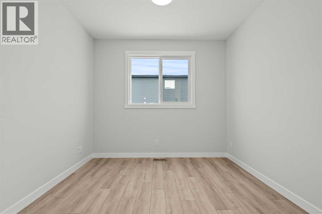 298 Kinniburgh Loop, Chestermere, Alberta  T1X 3C3 - Photo 5 - A2279032