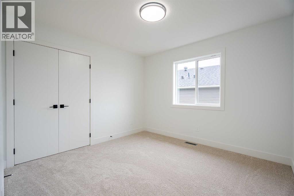 1433 Scarlett Ranch Boulevard, Carstairs, Alberta  T0M 0N0 - Photo 26 - A2236105