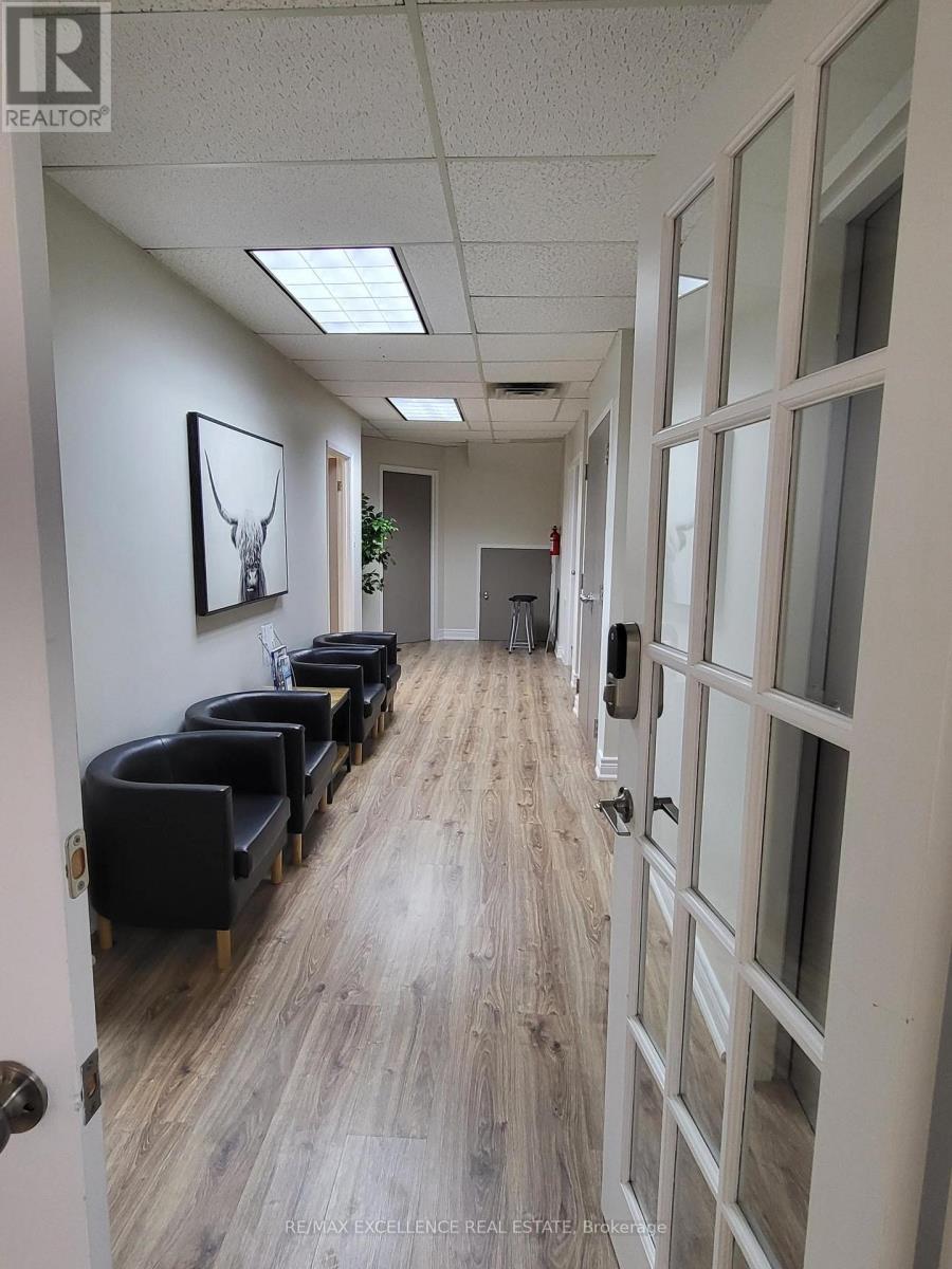 103 - 2896 South Sheridan Way, Oakville, Ontario  L6J 7L4 - Photo 1 - W12719106