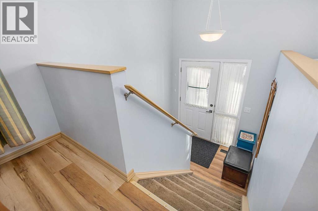 118 Bridleridge Way Sw, Calgary, Alberta  T2Y 4K8 - Photo 3 - A2280757