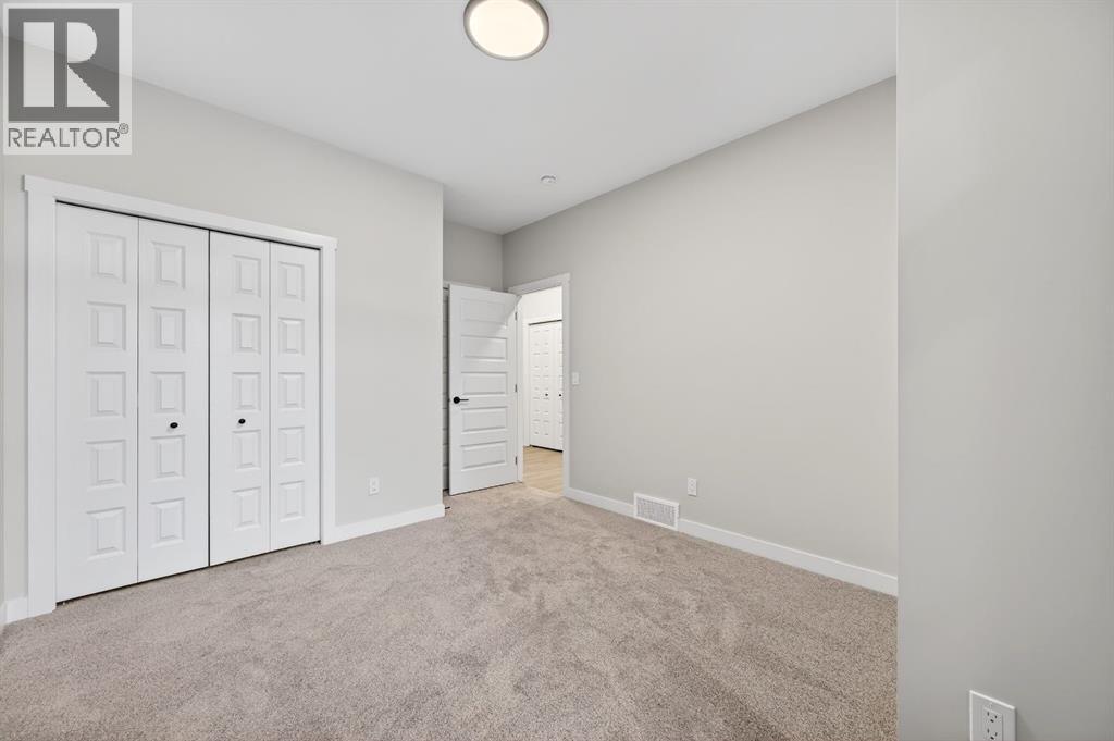 2242 Bayview Drive Sw, Airdrie, Alberta  T4B 5N4 - Photo 28 - A2279707