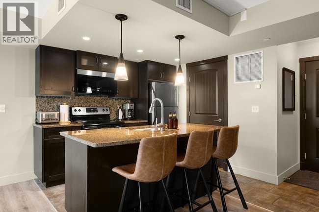 2206, 250 2 Avenue, Dead Man's Flats, Alberta  T1W 2W4 - Photo 3 - A2269582