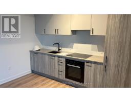 606 - 1 QUARRINGTON LANE, Toronto, Ontario