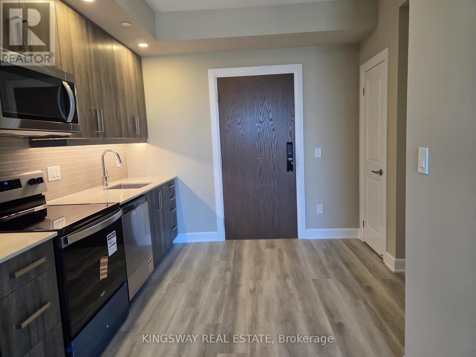 1405 - 3240 William Coltson Avenue, Oakville, Ontario  L6H 8C8 - Photo 4 - W12720128