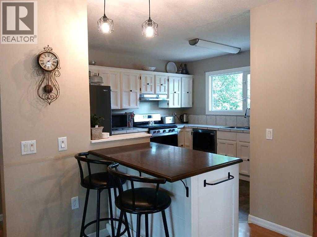 3808 49 A Avenue, Innisfail, Alberta  T4G 1J2 - Photo 9 - A2272519