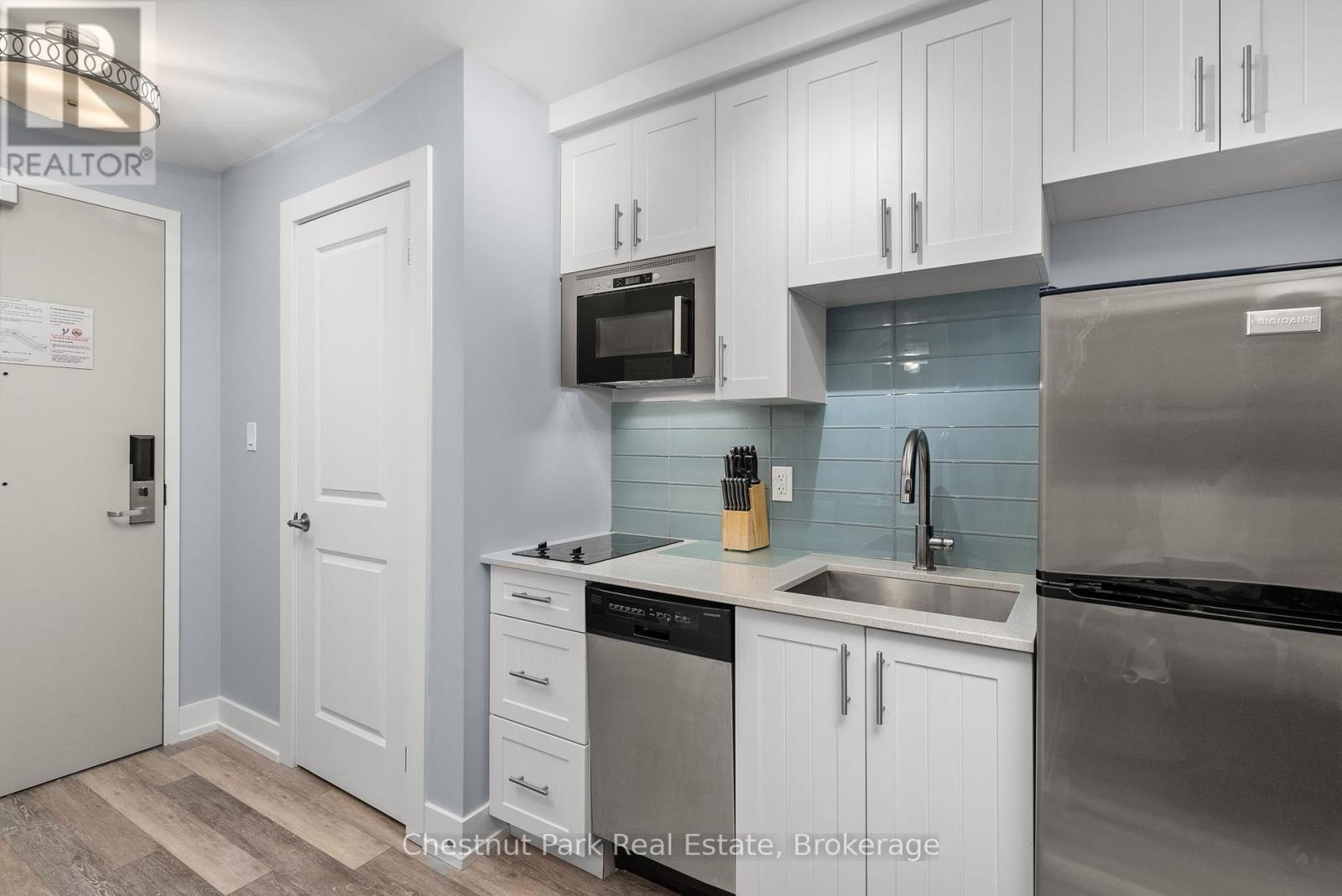 206 - 25 Pen Lake Point Road, Huntsville, Ontario  P1H 1A9 - Photo 5 - X12720654