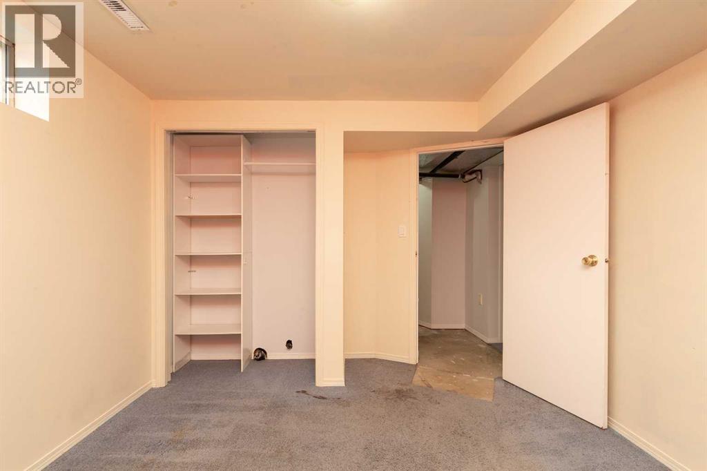 209 Mt Blakiston Road W, Lethbridge, Alberta  T1K 6M3 - Photo 21 - A2277374