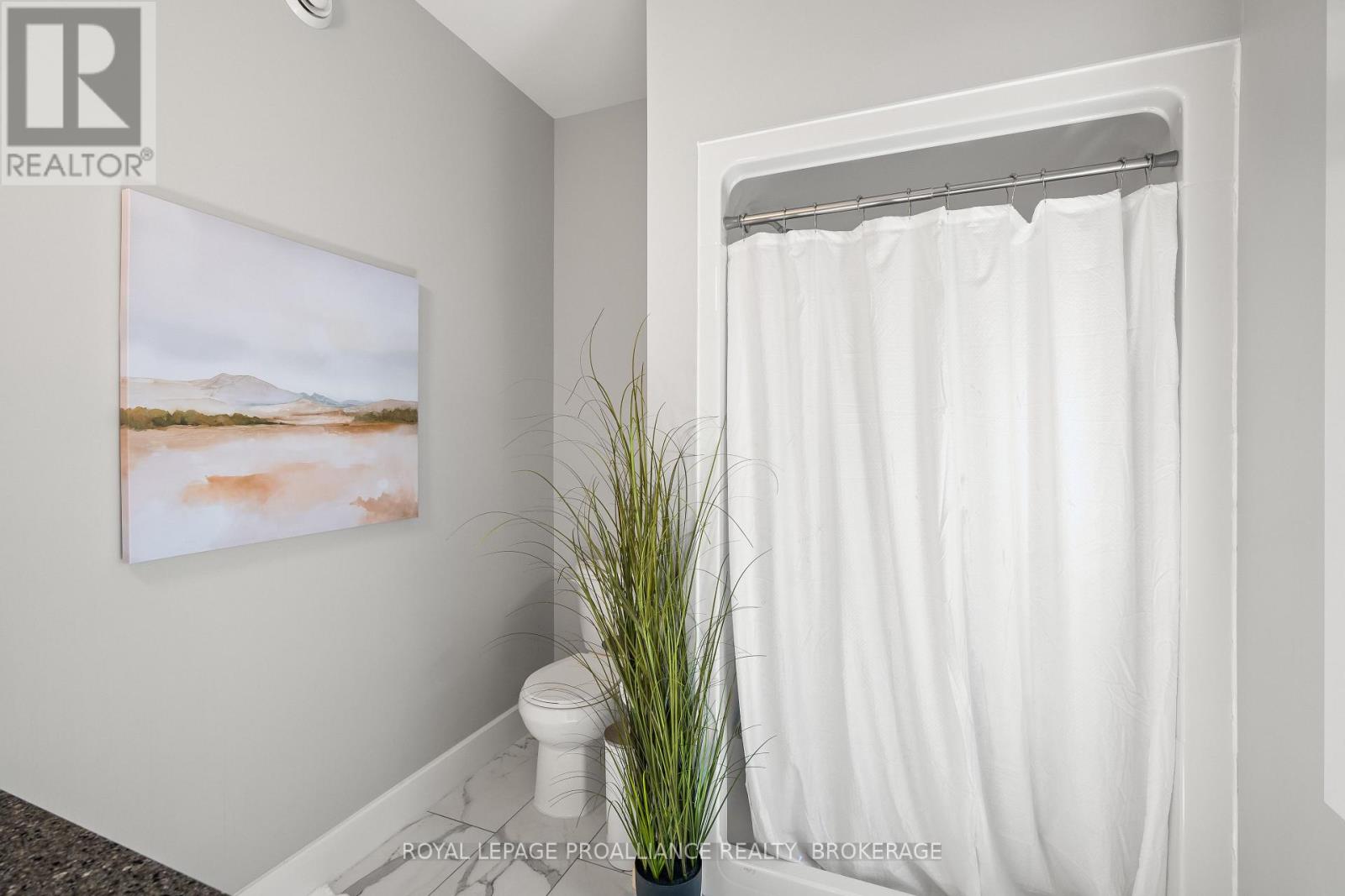 60 Potter Drive, Loyalist, Ontario K0H 2H0 - Photo 25 - X12709566