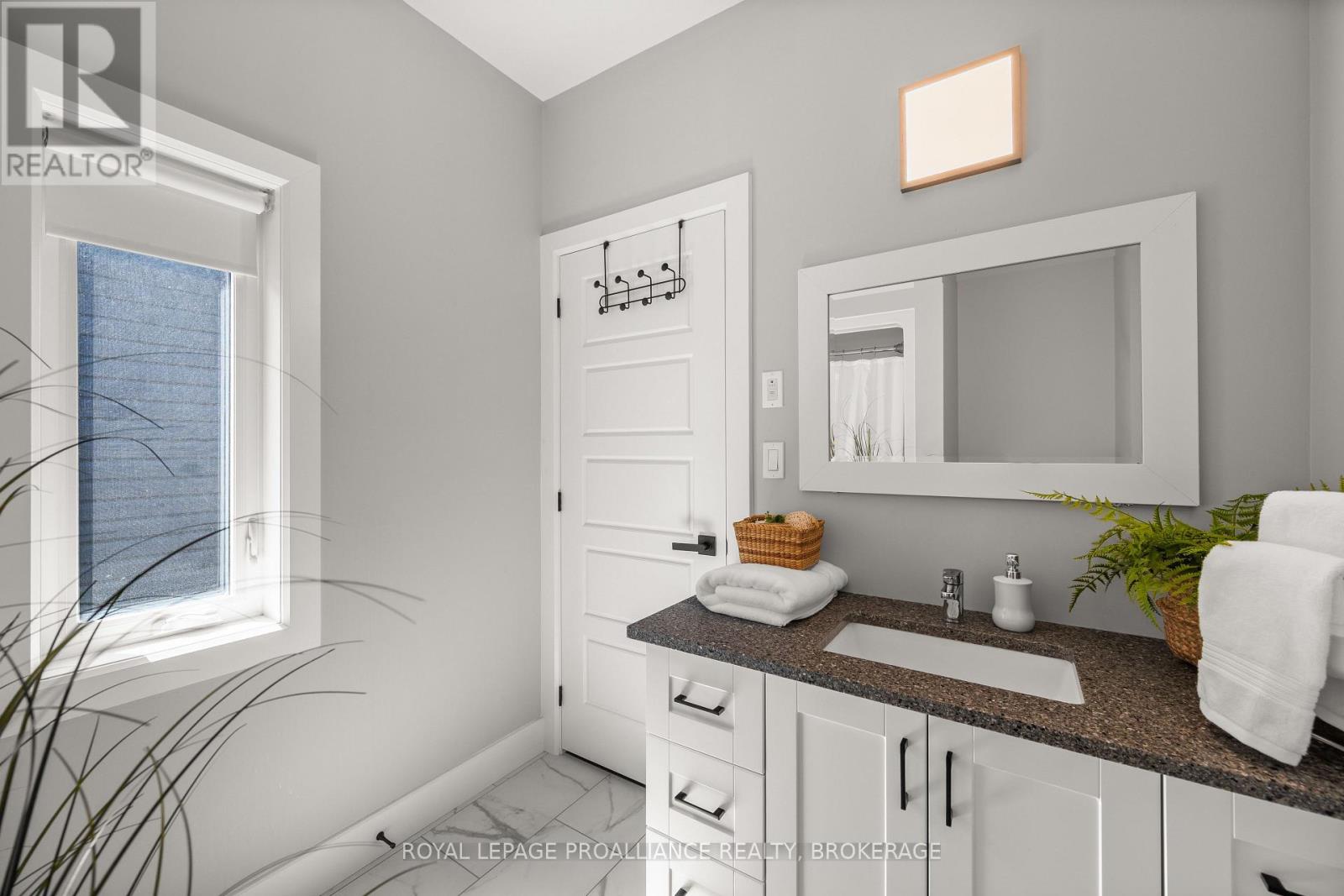 60 Potter Drive, Loyalist, Ontario K0H 2H0 - Photo 26 - X12709566