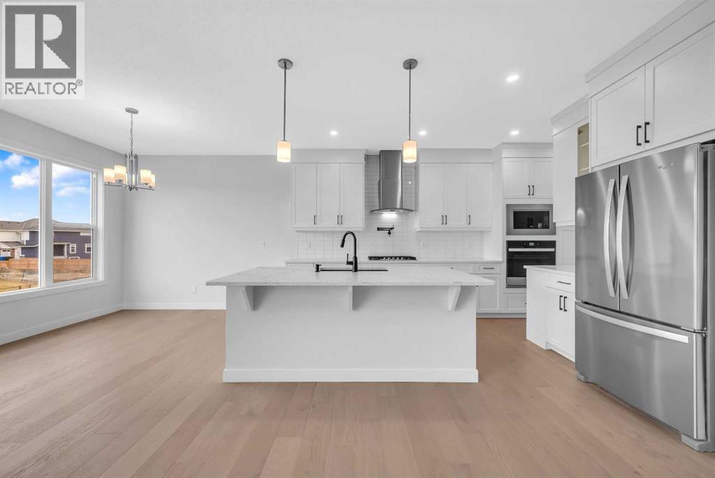 211 Chelsea Park, Chestermere, Alberta  T1X 2T3 - Photo 9 - A2272194