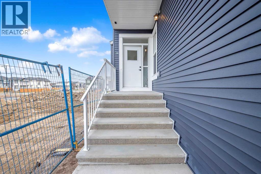 211 Chelsea Park, Chestermere, Alberta  T1X 2T3 - Photo 3 - A2272194