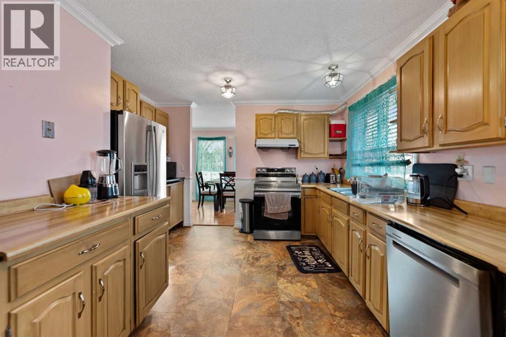 892 Abbotsford Drive Ne, Calgary, Alberta  T2A 6B8 - Photo 17 - A2279402