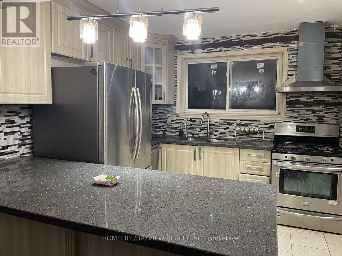 67 Neames Crescent, Toronto, Ontario  M3L 1K8 - Photo 2 - W12721756