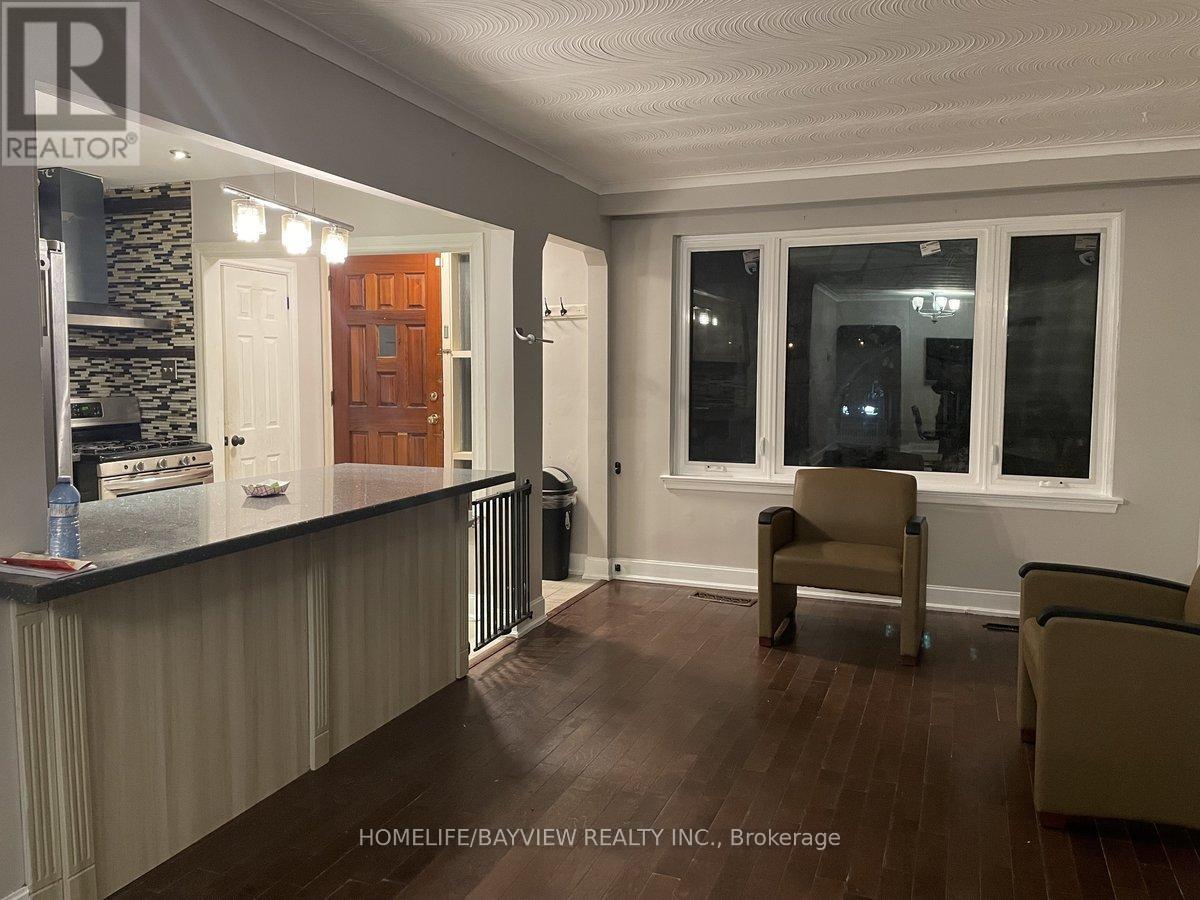 67 Neames Crescent, Toronto, Ontario  M3L 1K8 - Photo 3 - W12721756