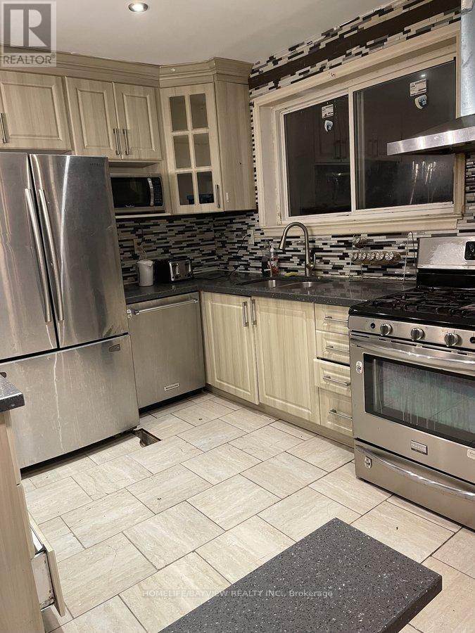 67 Neames Crescent, Toronto, Ontario  M3L 1K8 - Photo 5 - W12721756