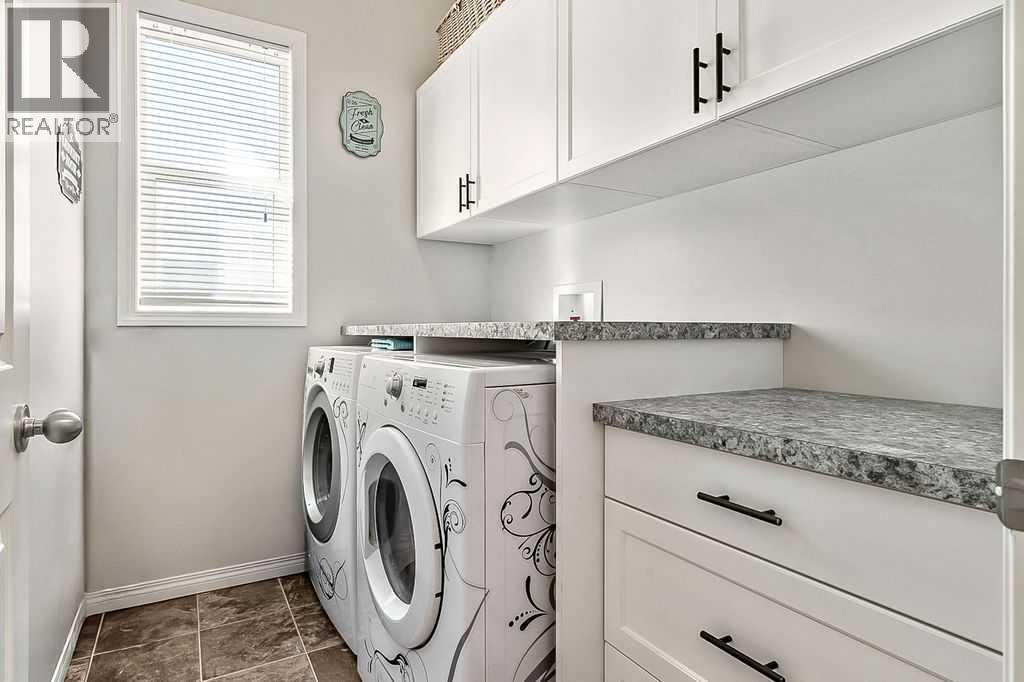 394 Cimarron Boulevard, Okotoks, Alberta T1S 0A9 - Photo 11 - A2263407