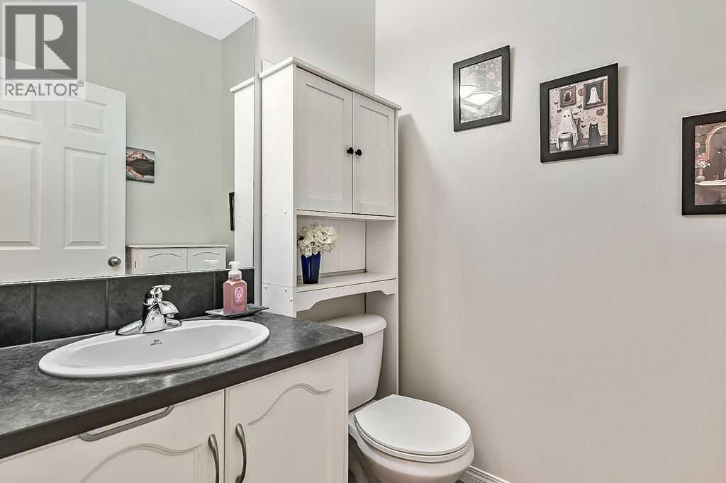 394 Cimarron Boulevard, Okotoks, Alberta T1S 0A9 - Photo 12 - A2263407