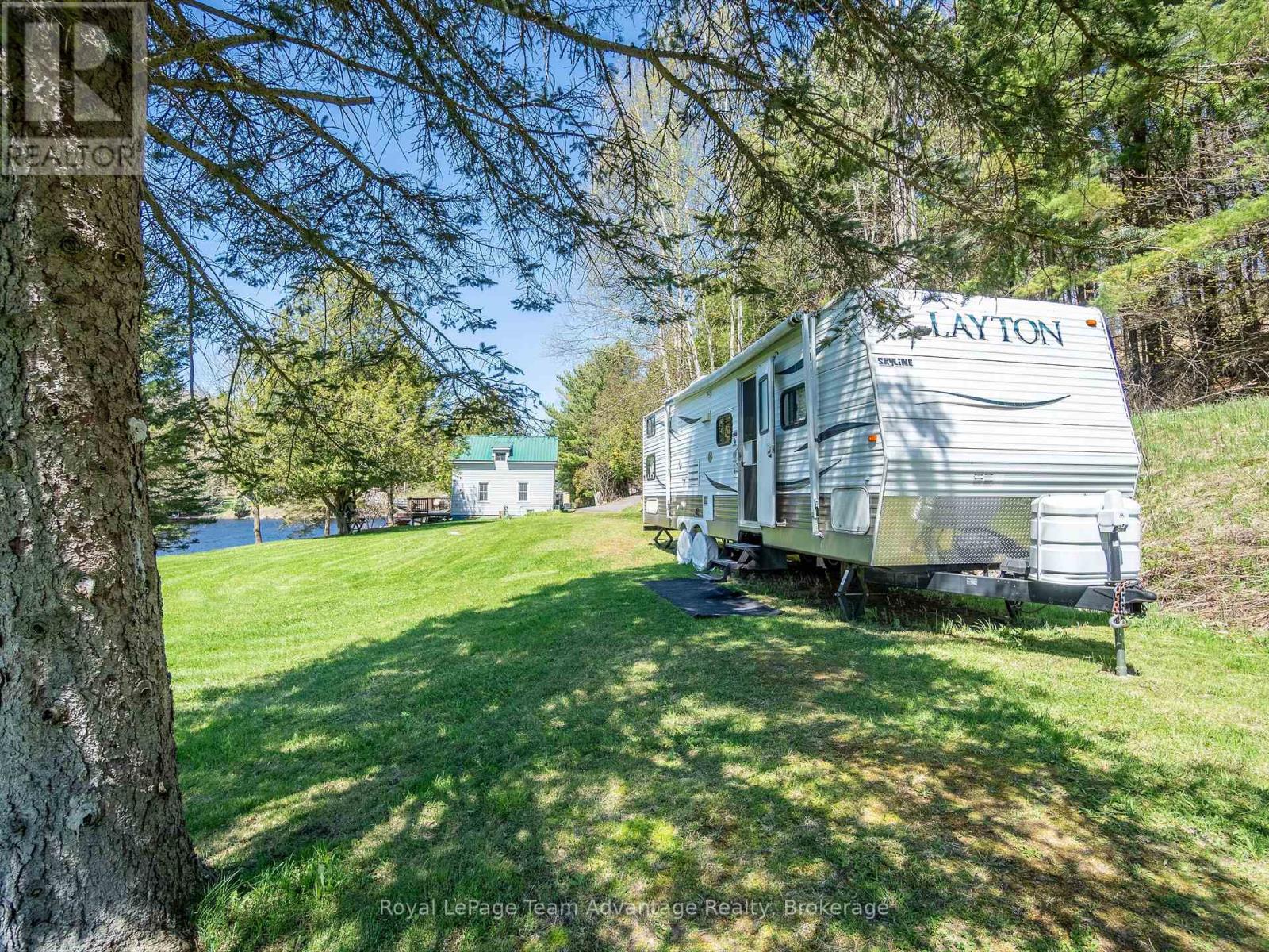 27 Burnside Bridge Road, Mcdougall, Ontario  P2A 2W9 - Photo 4 - X12721810